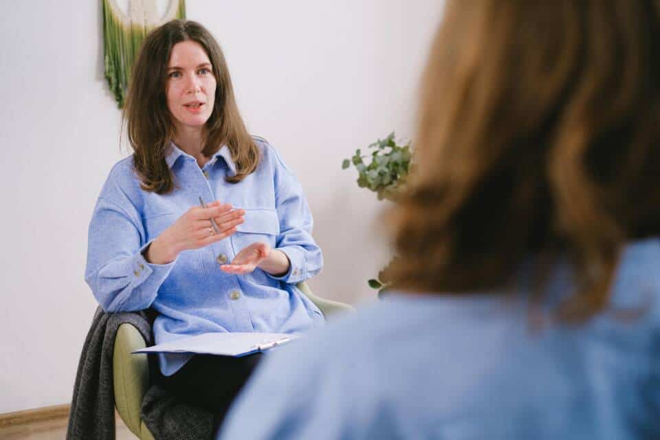 Therapist with client