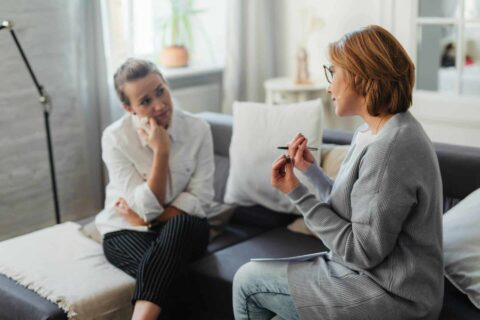 Therapist with client