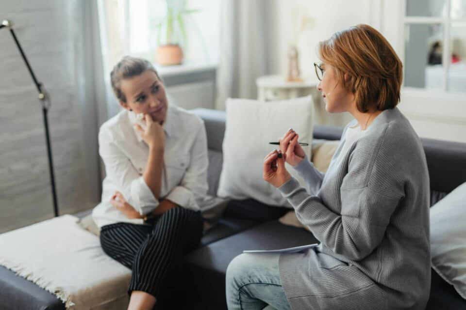 Therapist with client